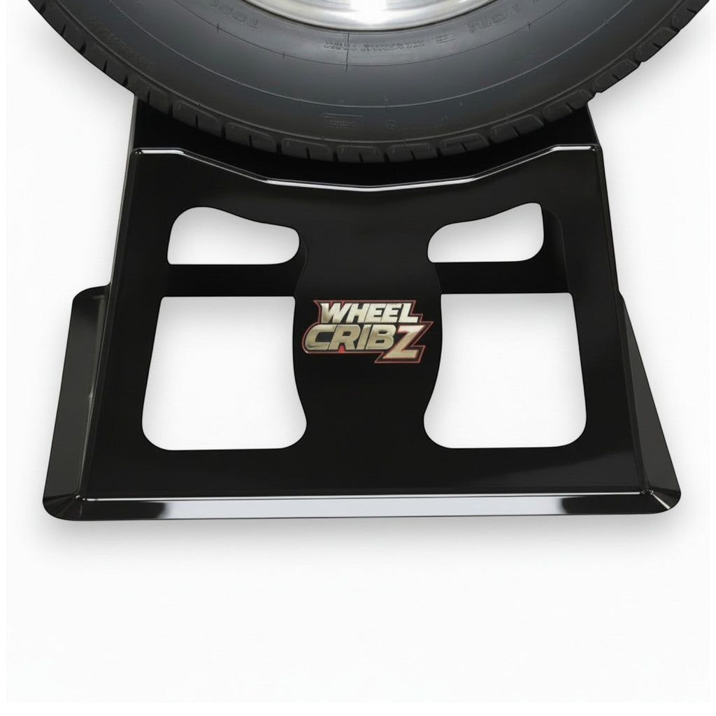Henderson Race Shop Store 12-inch black steel wheel crib supporting a car tire for maintenance and display.