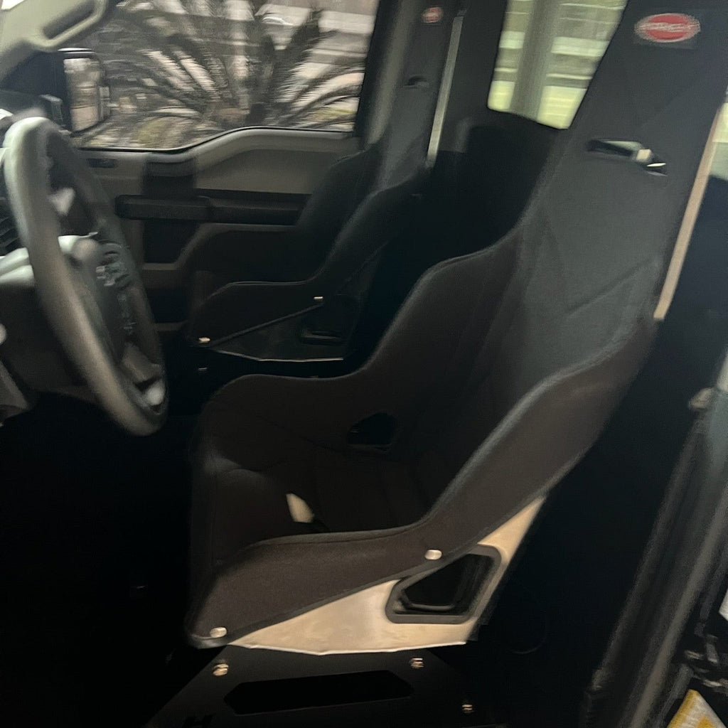 Henderson Race Shop Store seat mounts installed with a Kirkey racing seat inside a 2015+ Ford F-150 truck cabin.