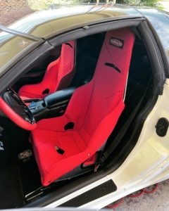 Henderson Race Shop Store Kirkey high-back racing seat installed in a Chevrolet Corvette interior
