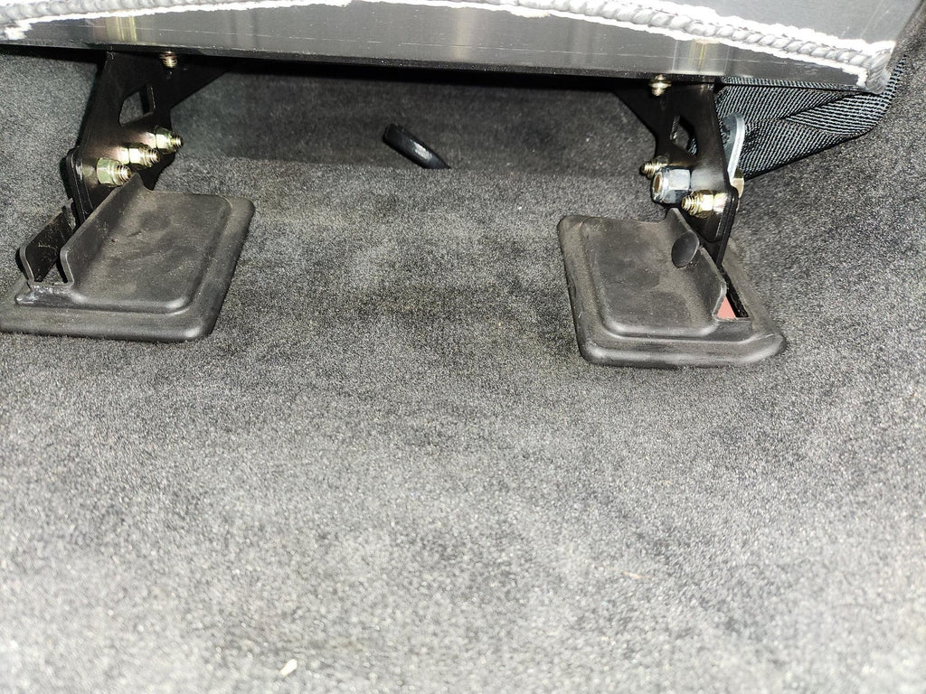 Henderson Race Shop Store black steel seat mount brackets installed under a Kirkey racing seat in a Ford Mustang