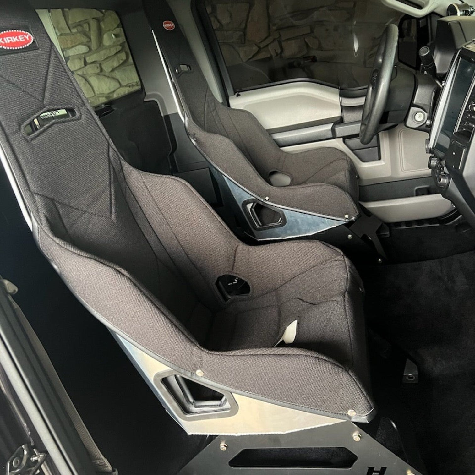 Henderson Race Shop Store seat mounts installed with Kirkey racing seats in a Ford F-150 interior