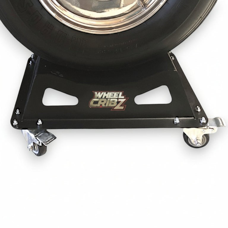 Henderson Race Shop Store black mobile wheel crib with heavy-duty casters supporting a vehicle tire on a white background