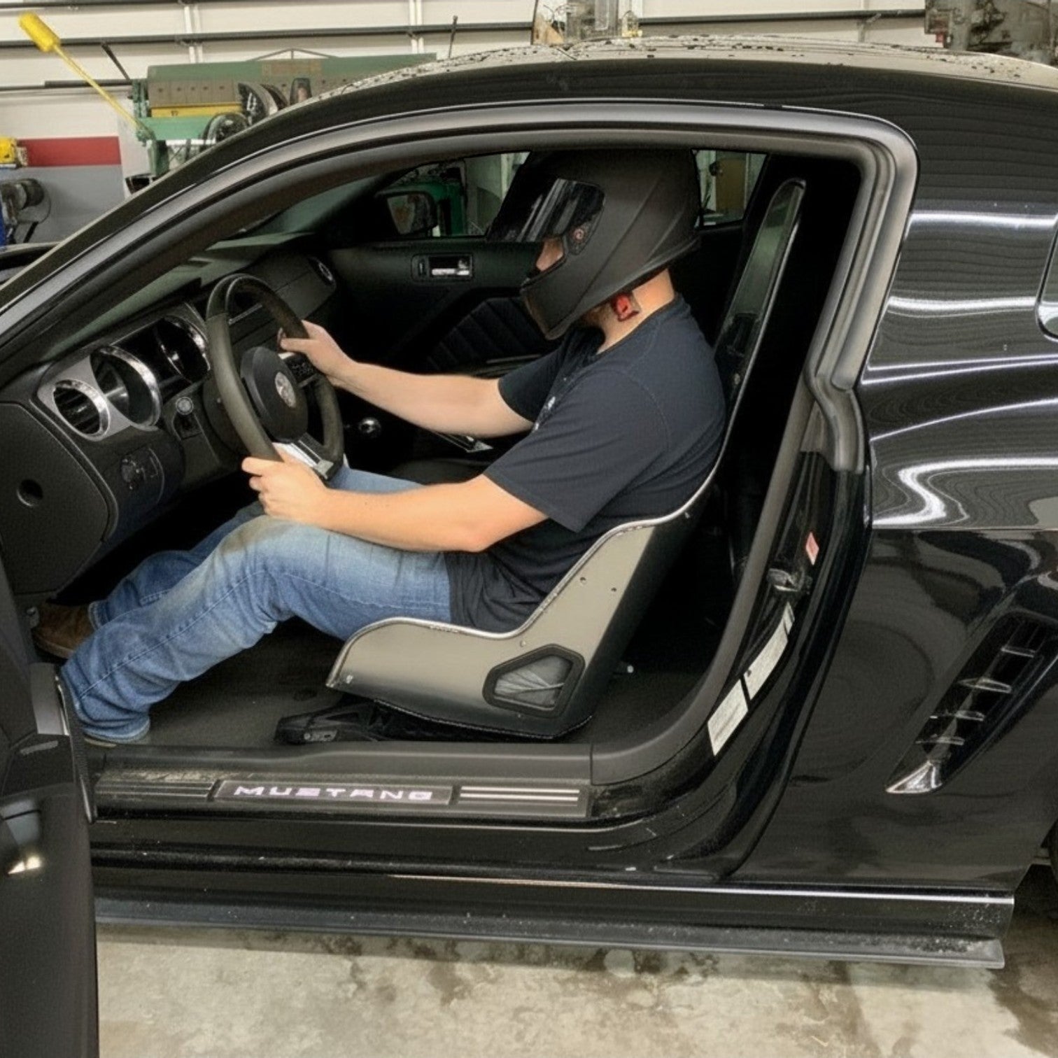 Henderson Race Shop Store seat mounts installed with a Kirkey racing seat in a 2005-2014 Ford Mustang S197 interior