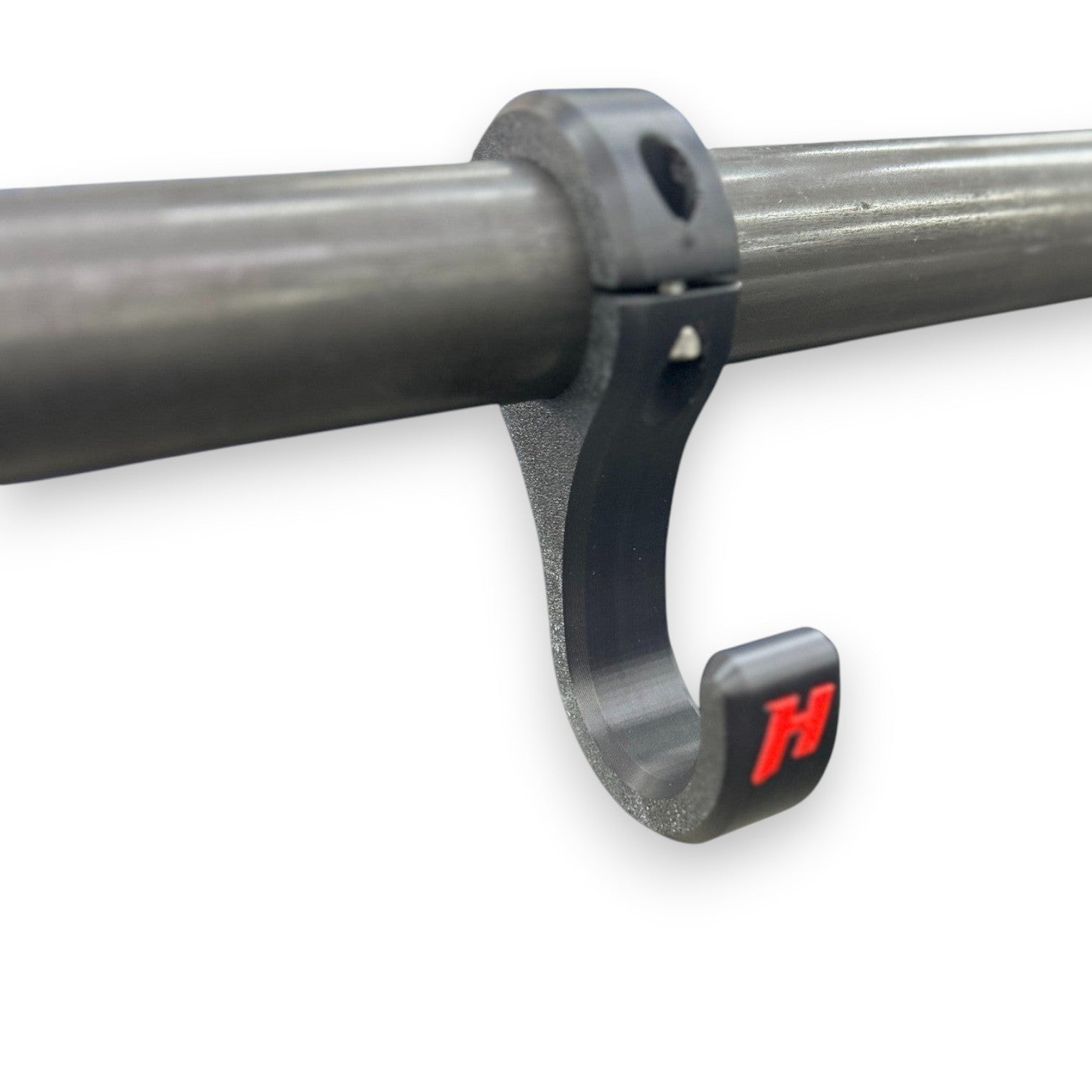Henderson Race Shop Store black ASA roll bar hook with red HRS logo mounted on a metal tube for helmet storage