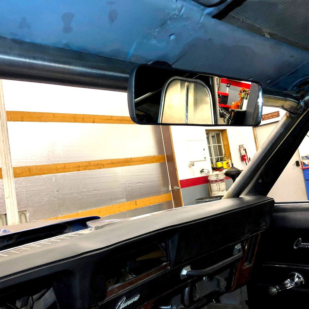 Henderson Race Shop Store lightweight rear view mirror mounted on a race car roll cage for improved track visibility