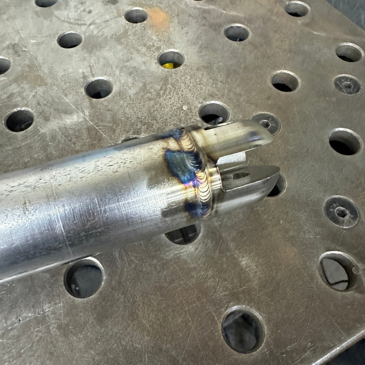 Henderson Race Shop Store roll cage swing-out kit component welded to steel tubing with precision-machined end