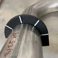 Henderson Race Shop Store rotational layout tool snapped onto a metal tube for marking precise rotational angles.