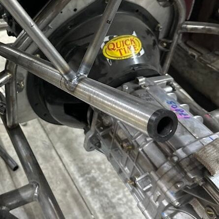 Henderson Race Shop Store steering shaft bushing installed in custom metal tubing for a race car steering column