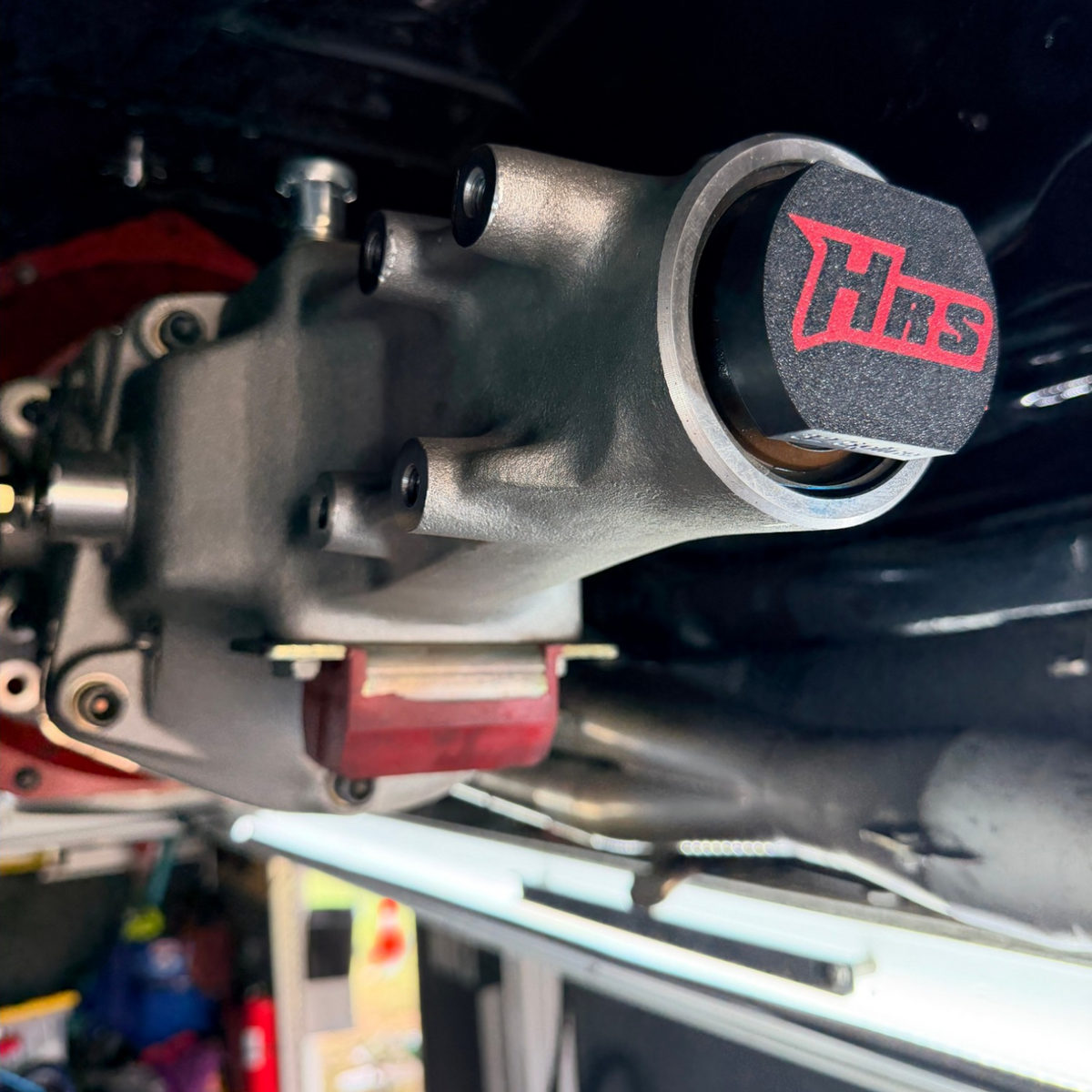 Henderson Race Shop Store transmission output splined alignment tool installed on a transmission shaft