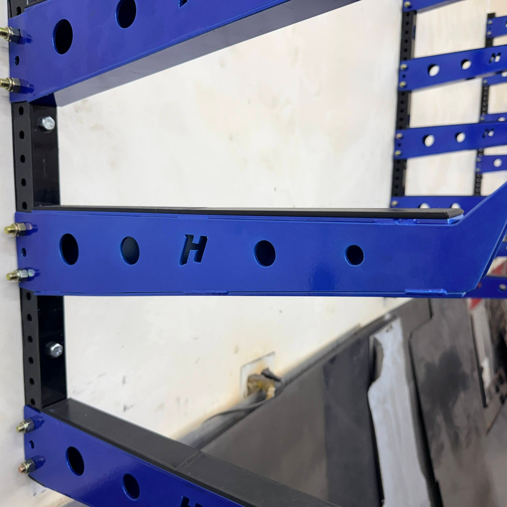 Henderson Race Shop Store wall mounted blue metal storage rack with 18 inch arms and protective TPU covers