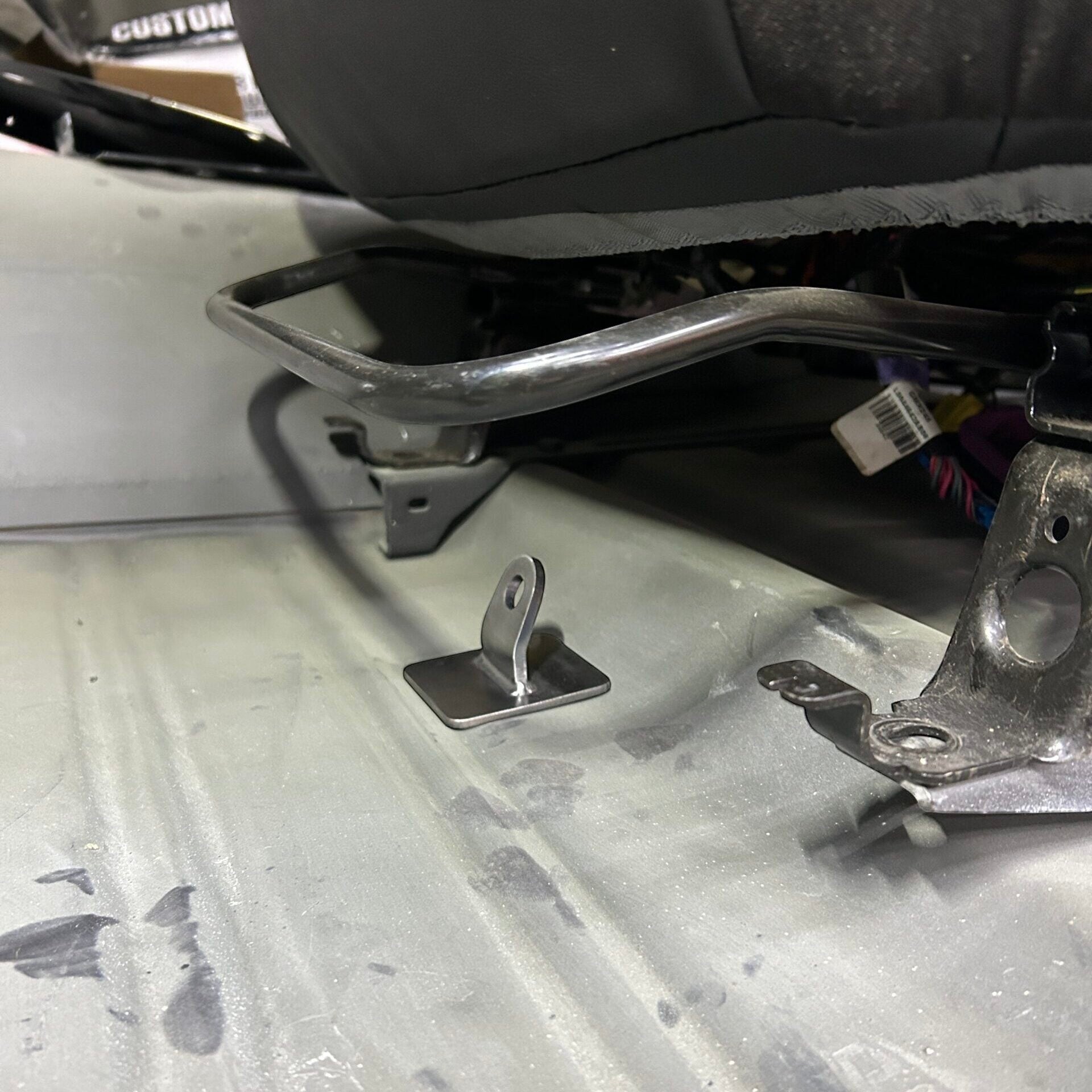 Henderson Race Shop Store weld-in steel floor mount for 5-point harness submarine belt installed on vehicle floor
