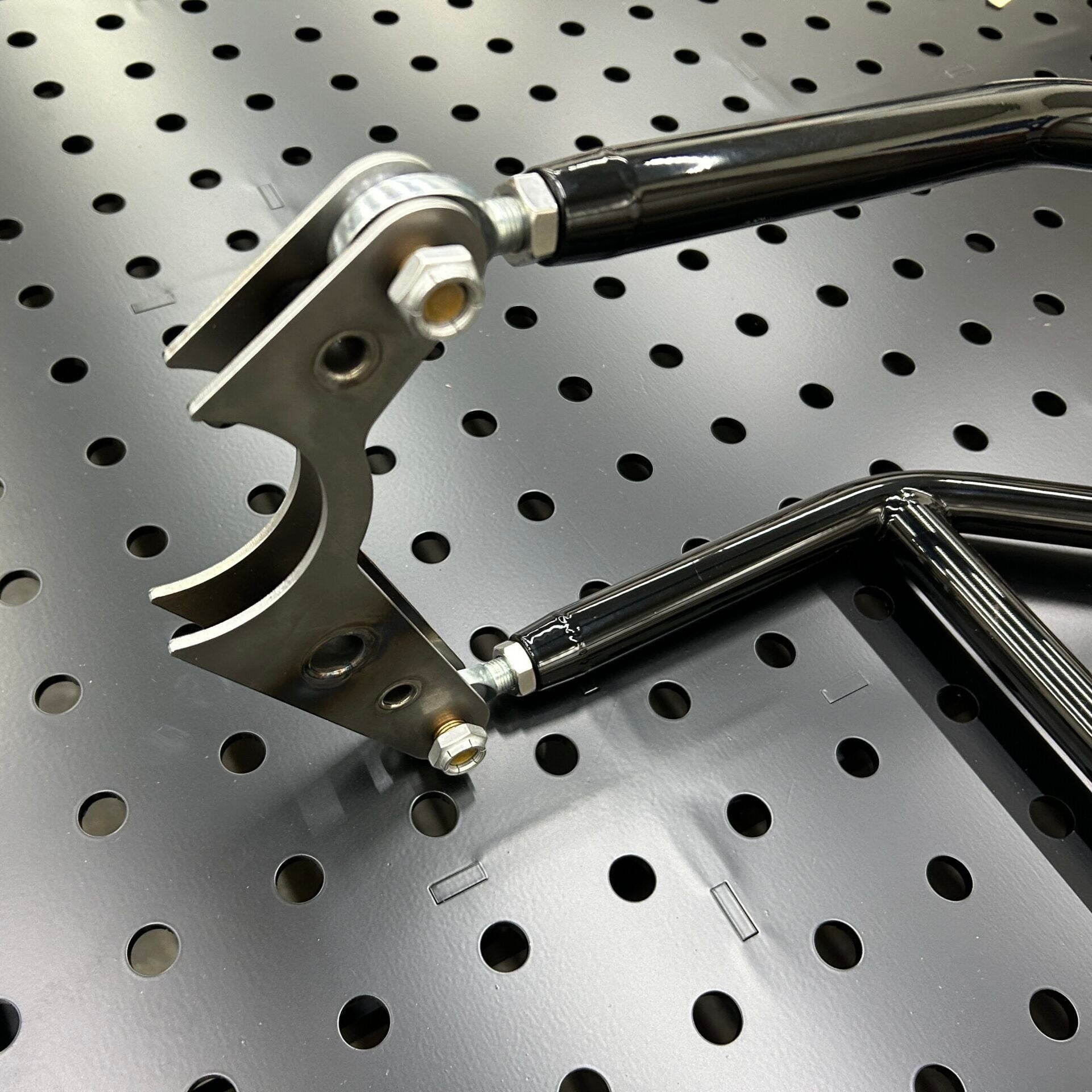 Henderson Race Shop Store single wheelie bar axle bracket with heavy duty spring slider and chromoly construction